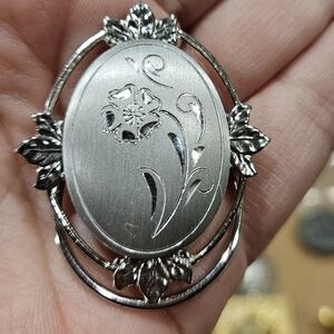 Elegant Silver Floral Brooch